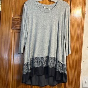 Logo by Lori Goldstein. Grey tunic top - size M